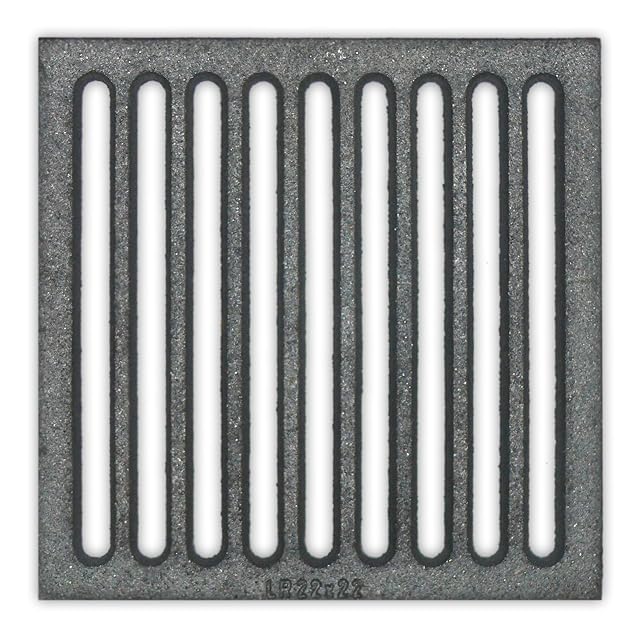 A square cast fire grate measuring 22 by 22 centimetres lying flat