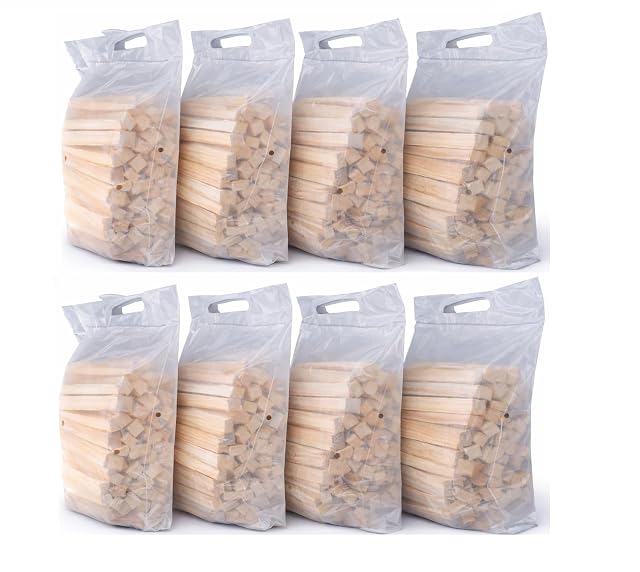 Eight 2.5 kg bags of chamber-dried pine and spruce kindling with carry handles and ventilation holes